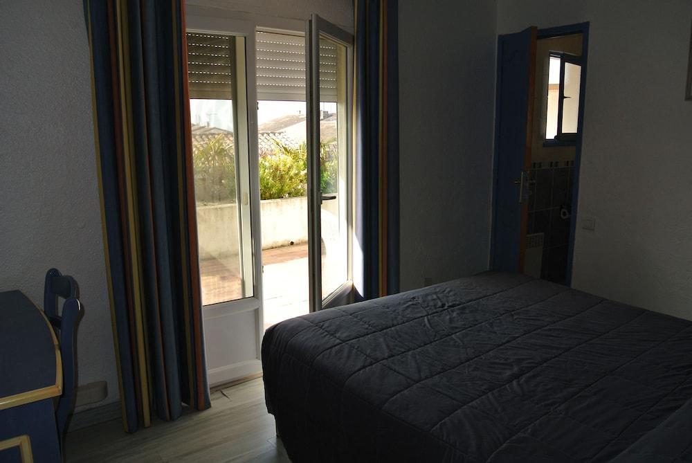Hotel Les Palmiers En Camargue Сент-Мари-де-ла-Мер Экстерьер фото