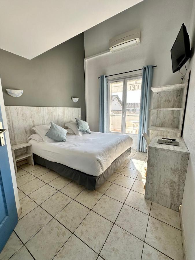 Hotel Les Palmiers En Camargue Сент-Мари-де-ла-Мер Экстерьер фото