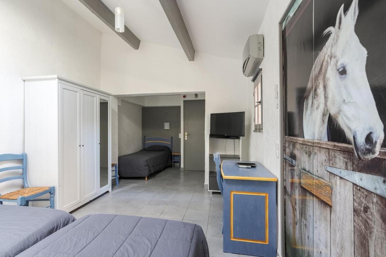 Hotel Les Palmiers En Camargue Сент-Мари-де-ла-Мер Экстерьер фото